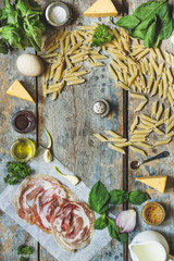 pasta penne   - pasta with creamy sauce and cheese (ingredients are white sauce) - cuisine.  Food background