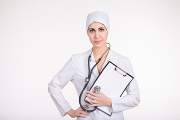 Portrait of a friendly female doctor isolated on white