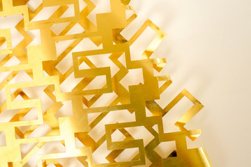 metal gold color geometry cut on white background