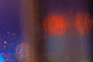 Abstract out of focus background. View through the window glass