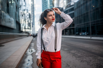 Fototapeta premium The modern business woman on the street