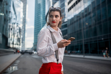 Business Woman With Phone Near Office