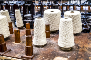 Traditional wool reels of the british waving and textile industry