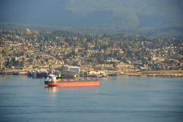 Oil Tankers at Vancouver Harbour with North Vancouver at the background, Vancouver, British Columbia, Canada.