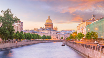 Fototapeta premium Saint Isaac Cathedral across Moyka river in St. Petersburg