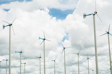 Wind turbines in cloudy days , Windmills for electric power production at "Chang-Hua-Mun” Royal Initiative Project,Thailand
