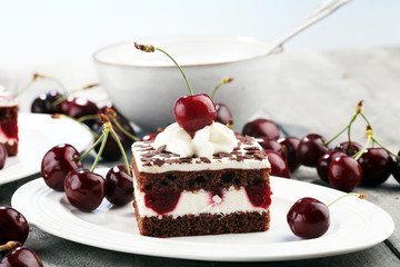 Chocolate cake with cherries and whipped cream. Black Forest cake