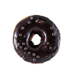 Single chocolate glazed donut with chocolate chips isolated white background top view