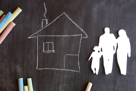 chalk board and chalk. School board for records. A drawing on a black background with colored crayons