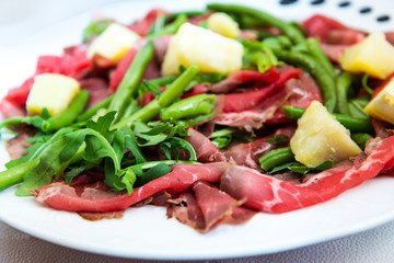 close up of tasty cold meats on the table