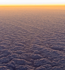 Cloudscape at dawn, in-flight shot.