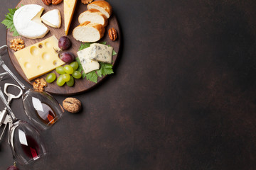 Cheese plate with grapes and nuts