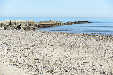 Fototapeta na wymiar Disintegrating jetty on Cape Cod Bay