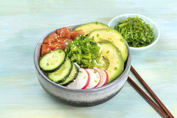 Hawaiian tuna poke salad with wakame and sauce