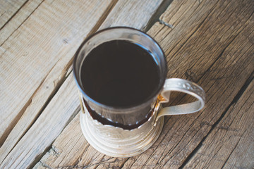 Tea in the Russian cup holder.
