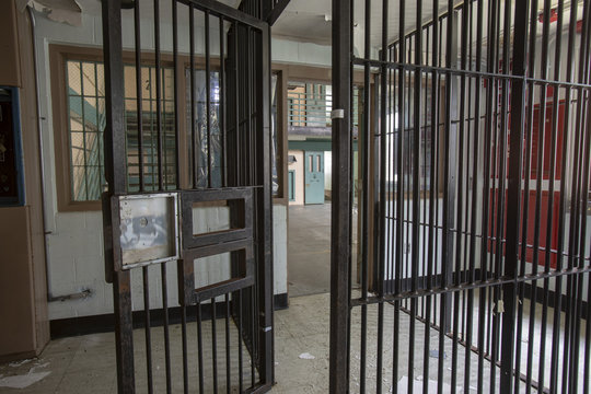 Metal bars leading into cellblock in prison