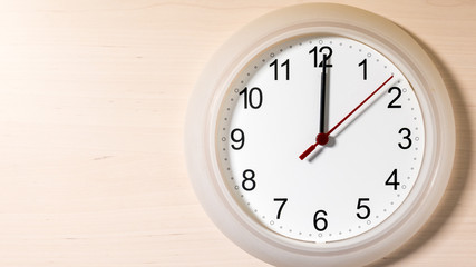 Clock ticking showing twelve hours