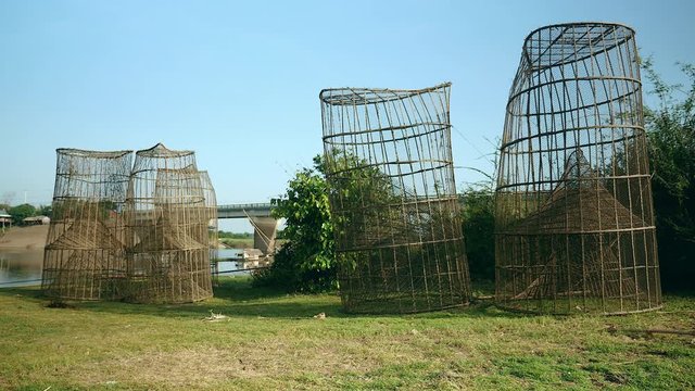 Bamboo fish traps on the riverbank ( close up )