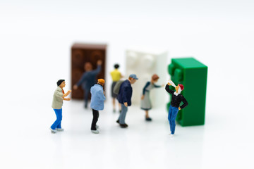 Miniature people: Group people queuing for use Vending Machine. Image use for Business of Convenience.