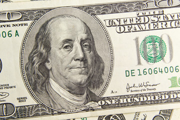 Front of the one hundred dollar bill with a Portrait of President Benjamin Franklin's close-up