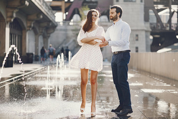 elegant couple in a city