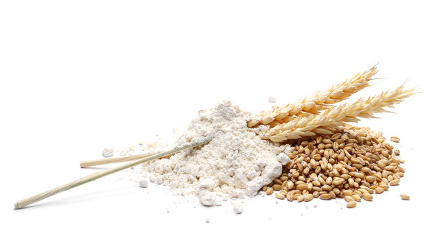 Flour and wheat ears, with grain isolated on white background