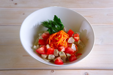 Salad with spicy carrot, tomato and chicken