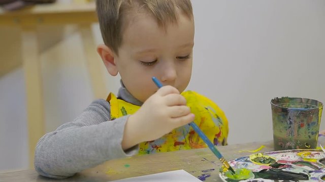 children, the child draw a still life.