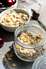  Breakfast of organic oatmeal with milk and fresh cherries