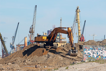 excavator, scoop-earth, on the construction site