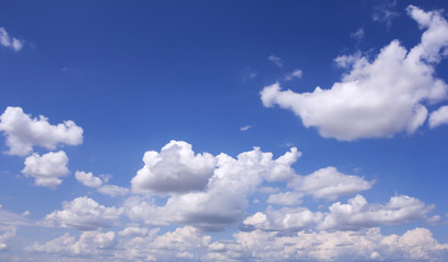 Naklejka na ściany i meble Blue sky with white clouds as background