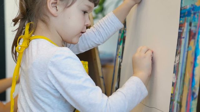 children, the child draw a still life.