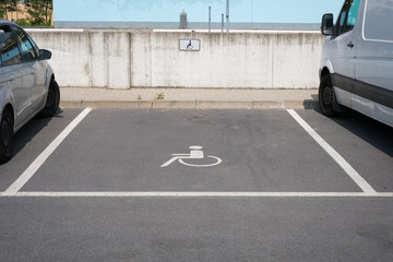 handicapped parking spot with wheelchair symbol
