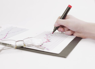 close-up. business woman working with a marketing schedule.