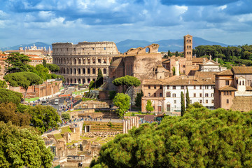 Fototapeta na wymiar Aerial scenic view of Colosseum and Roman Forum in Rome, Italy. Rome architecture and landmark.