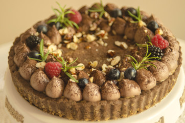 Chocolate tart with bluberries and rasberries