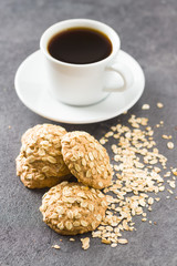 Healthy oatmeal cookies and cup of coffee.