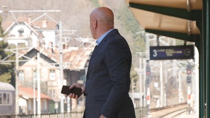 Businessman Waiting a Meeting in Train Station 