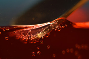 Macro photo of red liquid in glass