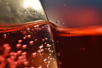 Macro photo of red liquid in glass