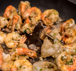 Jumbo Shrimp Scampi Sauteeing in Butter and Olive Oil
