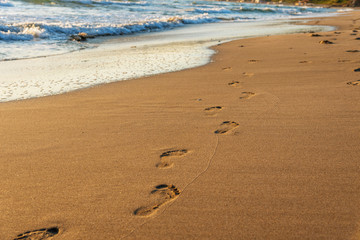 Footsteps on the beach.