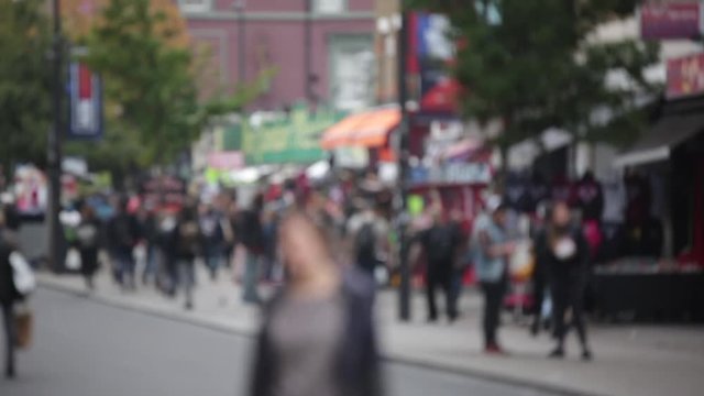 Anonymous crowds in Camden, London - out of focus