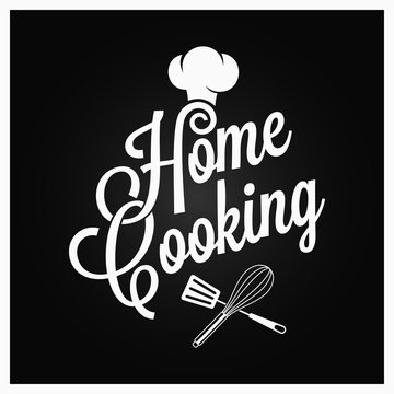 Home cooking vintage lettering with kitchen utensils on dark background
