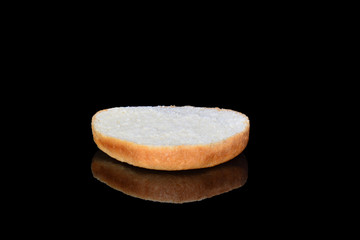 Grilled burger bun isolated on white background. Close up