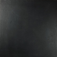 Black cement background.Black wall.