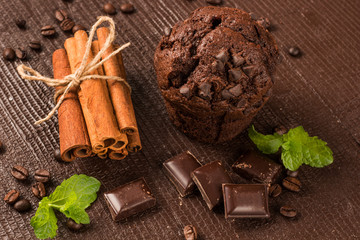 chocolate muffin with cinnamon sticks