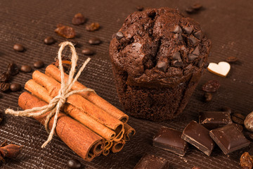 chocolate muffin with cinnamon sticks