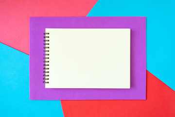 Minimal, pop art, abstract, vivid mockup with white notepad on bright red, pink, blue and lilac...