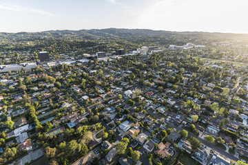Late afternoon aerial view of Sherman Oaks and Encino in the San Fernando Valley area of Los Angeles, California.